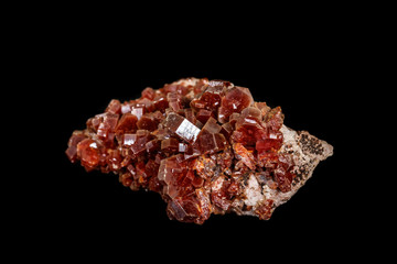 Macro mineral stone Vanadinite on a black background