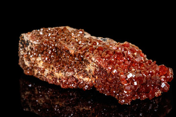 Macro mineral stone Vanadinite on a black background