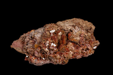 Macro mineral stone Vanadinite on a black background