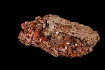 Macro mineral stone Vanadinite on a black background