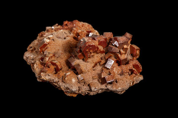 Macro mineral stone Vanadinite on a black background