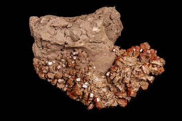 Macro mineral stone Vanadinite on a black background