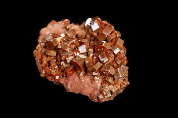 Macro mineral stone Vanadinite on a black background