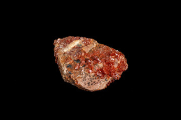 Macro mineral stone Vanadinite on a black background