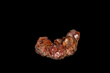 Macro mineral stone Vanadinite on a black background