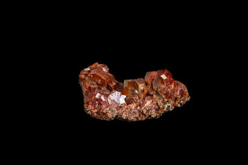 Macro mineral stone Vanadinite on a black background