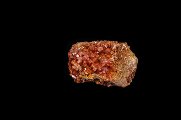 Macro mineral stone Vanadinite on a black background