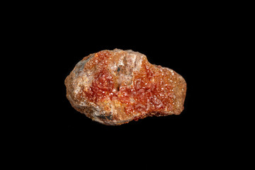 Macro mineral stone Vanadinite on a black background
