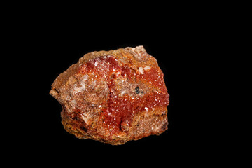 Macro mineral stone Vanadinite on a black background