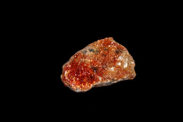 Macro mineral stone Vanadinite on a black background