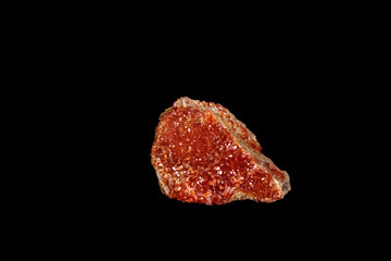 Macro mineral stone Vanadinite on a black background