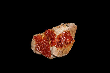 Macro mineral stone Vanadinite on a black background