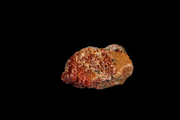 Macro mineral stone Vanadinite on a black background