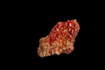 Macro mineral stone Vanadinite on a black background