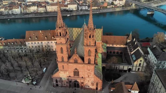 Famous Gothic-style Basel Minster, Cathedral in Basel, Switzerland at winter Aerial view of the Famous Gothic-style Basel Minster, Cathedral in Basel, Switzerland at winter sunset