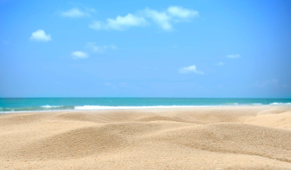 Fototapeta na wymiar Summer beach background. Sand and sea and sky copy space