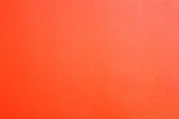 Pastel trend Living Coral background from paper, copy space
