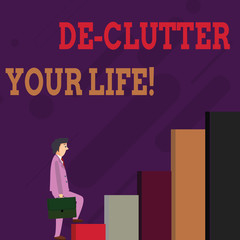 Handwriting text De Clutter Your Life. Conceptual photo remove unnecessary items untidy or overcrowded places Businessman Carrying a Briefcase is in Pensive Expression while Climbing Up