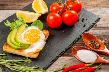 Healthy Breakfast. Sandwiches. Avocado toast with fried egg