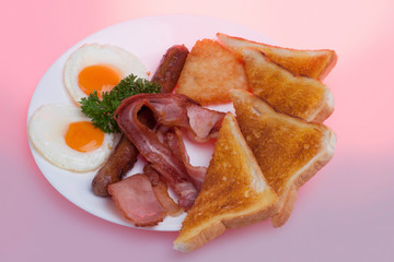 Sausages with breads and eggs plate