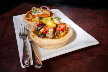 Fried burger with fruits and spoon