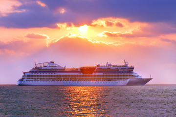 Luxury Cruise Ship. Beautiful Seascape Sunset Background. Romantic and Luxury Travel Concept.