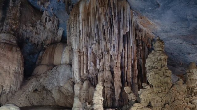 Ancient rock formations - stalactites and stalagmites in the cave in Central Vietnam.