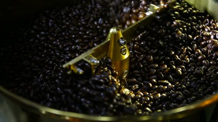 Modern roasted coffee beans in modern coffee roasters, commonly used today