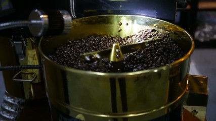 Modern roasted coffee beans in modern coffee roasters, commonly used today