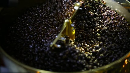 Modern roasted coffee beans in modern coffee roasters, commonly used today