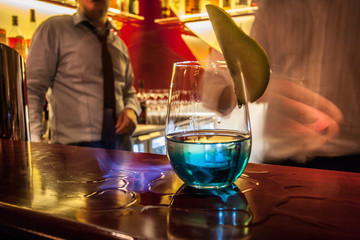 Lemon with wine glass on table