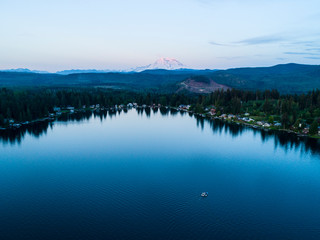 Mt Rainier Pink Light Background Above Lake With Fishing Boats Pacific NW Scene
