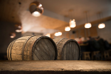 blurred background of bar and dark brown desk space of retro wood