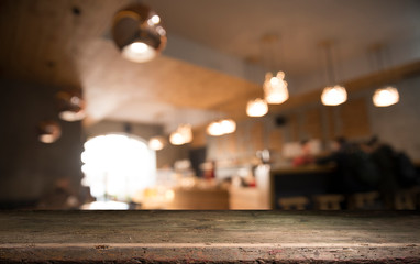 blurred background of bar and dark brown desk space of retro wood