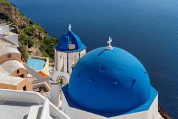 Blue and white domed churches on Santorini Greek Island, Oia town, Santorini, Greece.