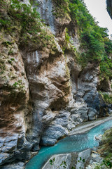 Fototapeta na wymiar Taroko national park canyon landscape in Hualien, Taiwan. Natural canyon and river view of Swallow Grotto (Yanzikou) hiking trail. 