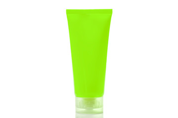 UFO green colored beauty cosmetics tube; branding mock up isolated on  white. Trendy neon color.