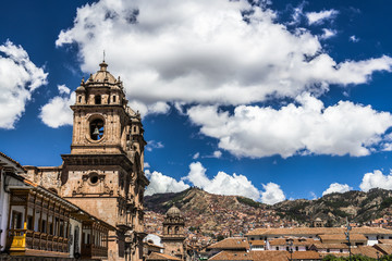 Fototapeta na wymiar Clouds above the tower in Cusco