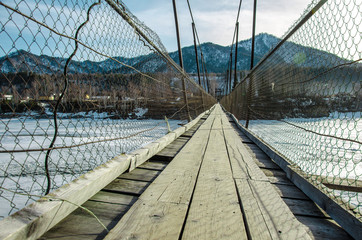 suspended wooden bridge
