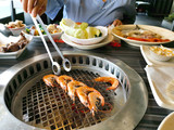Top view of fresh shrimp on grill. Barbecue