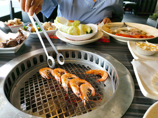Top view of fresh shrimp on grill. Barbecue