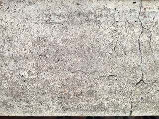 old concrete railing, cracks are visible in some places