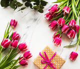 Pink spring tulips and gift box