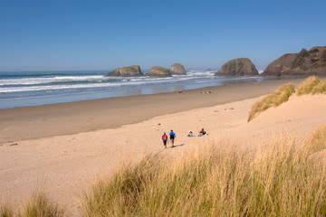 Walks on a sand Canon Beach Oregon coast