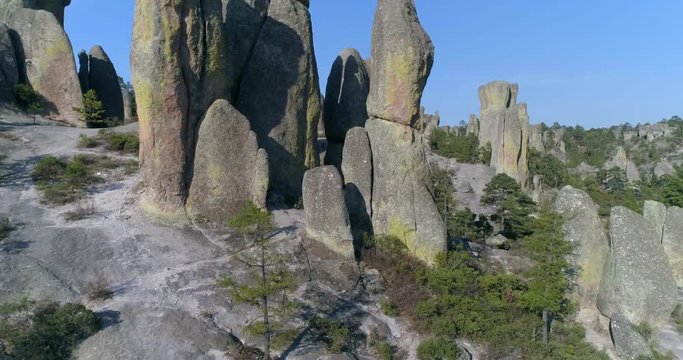 Aerial flying through shot of huge rock formations in El Valle de loss Monies, Copper Canyon Region, Chihuahua.