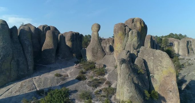 Aerial shot passing over rock formations in El Valle de loss Monies, Copper Canyon Region, Chihuahua.
