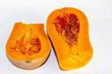 pumpkin fresh two halves on white background