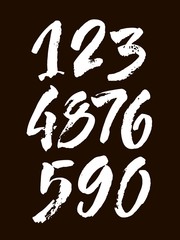 set of calligraphic acrylic or ink numbers. ABC for your design, brush lettering on a black background