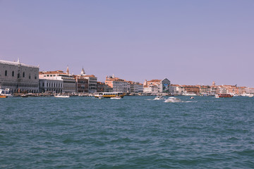 Fototapeta premium Panoramic view of Venice coast with historical buildings and Laguna Veneta