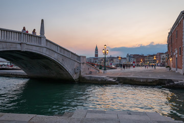 Fototapeta na wymiar Panoramic view of Laguna Veneta coast of Venice city with bridge